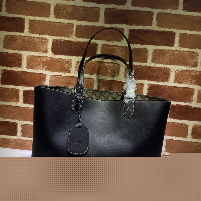 G*u*i shopping bags